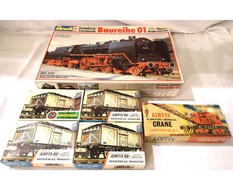 Six railway related HO/OO scale kits - Revell clas 01 - 4.6.2 Pacific and tender, Airfix - mineral wagons x4. All appear comp