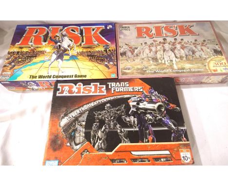 Three Parker Risk games; two World Conquest (one factory sealed) and Transformers Battle Edition, Cybertron. P&amp;P Group 1 