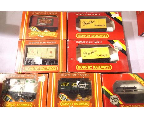 Seven Hornby OO wagons including Yorkshire Pudding Co x2, Golden shed, Fisons etc. Mostly in very good condition, boxes are f
