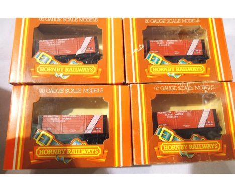 Four Hornby R094 Pilkington Glass St Helens open wagons, very good condition, boxes with wear. P&amp;P Group 1 (£14+VAT for t