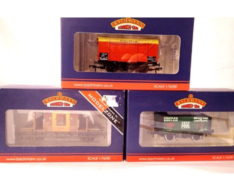 Three Bachmann exclusive wagons 37-5372 New Cross Gate, brake van (Modelzone), 37-101R Charles Sinclair, 7 Plank (Frizinghall