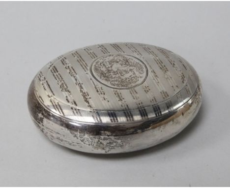 A George V engine turned silver oval tobacco box, by Charles Boyton & Son Ltd, Birmingham, 1910, 104cm, 3.5 oz.