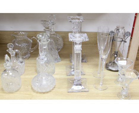Three graduated glass candlesticks and an epergne, candlesticks 41cm