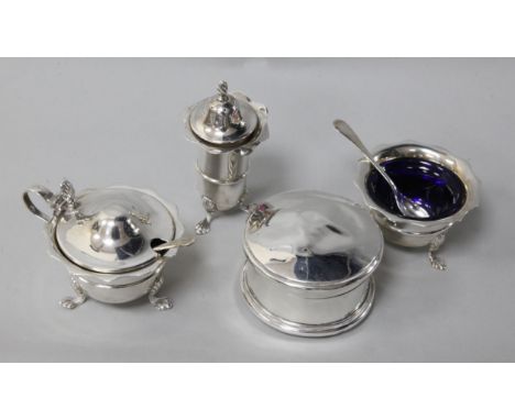 A Edwardian three piece silver condiment set and a damaged trinket box.