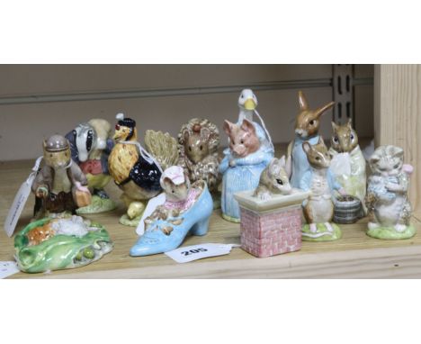 Twelve Beswick Beatrix Potter figures, mainly BP-3c and a Studio Royal Doulton figure of Johnny Town-Mouse with Bag, the Besw