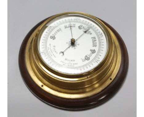 A ship's barometer, diameter 26cm