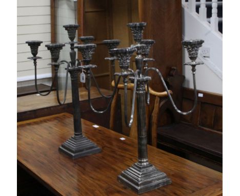 A pair of plated five light four branch candelabra, height 69cm