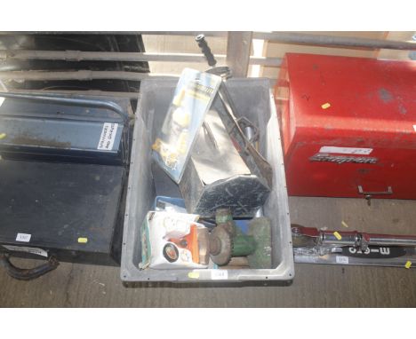 A box containing various tools including spanners etc 