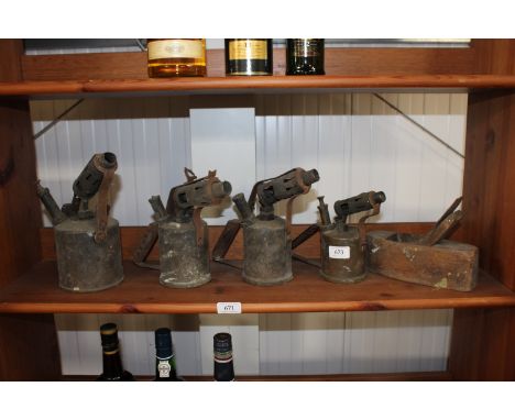 Four vintage blow lamps to include Optimun No.4 and a wooden planer