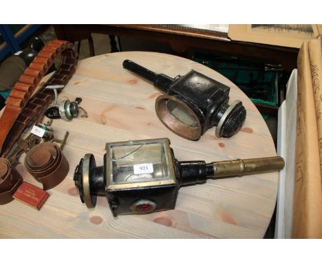 A brass &amp; iron carriage lamp and a copper and iron carriage lamp AF