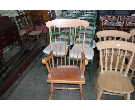 A stick back rocking chair
