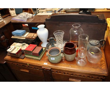 A collection of various playing cards, vintage games, a cash tin and a quantity of various Studio Pottery and glass vases