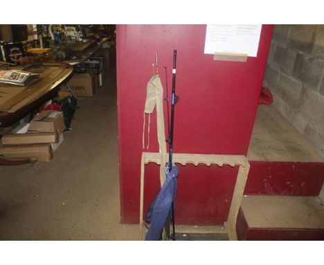 A Fladen Power Stick two piece fishing rod with carry bag together with one other