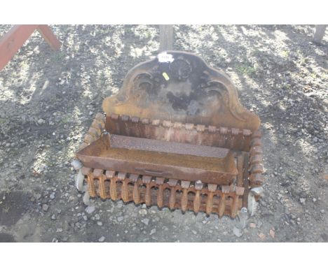 A cast iron fire grate