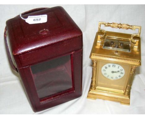 A 14.5cm hour repeating brass carriage clock with original lever escapement, the gilt brass case having ornate handle and cla