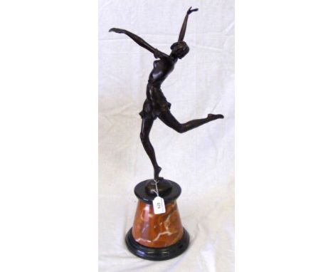 A 49cm bronze figure of an art deco dancing lady on marble plinth