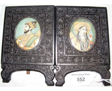A pair of finely painting oval miniature Indian portrait paintings in matching frames