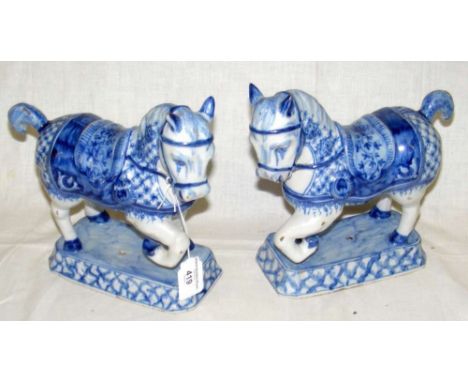 Pair of 21cm Delft polychrome blue and white model horses
