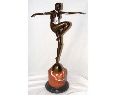 An Art Deco style bronze figure of a dancer on globe - on marble base - 56cm high overall