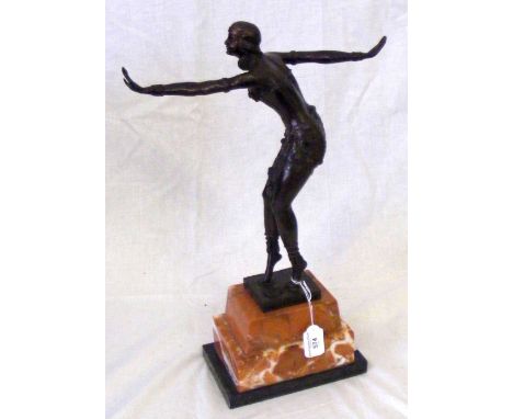 A 36cm high bronze art deco figure of a dancing lady on stepped marble plinth