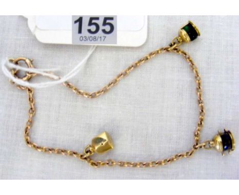 A 9ct gold charm bracelet mounted with 18ct port, starboard and masthead light charms