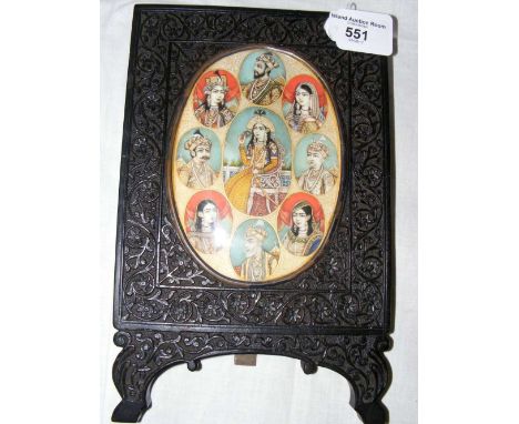 A group of nine finely painted Indian miniature portrait paintings in oval setting on carved easel stand