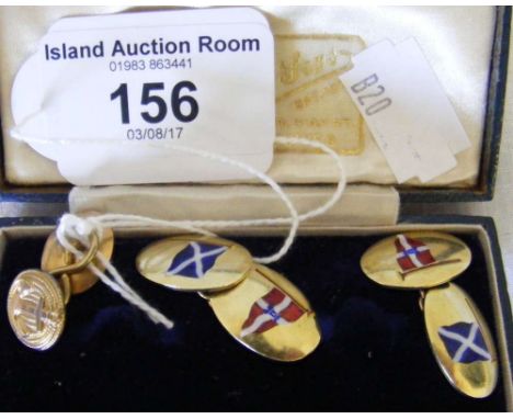 A pair of 14ct gold and enamel gent's cuff links with Sailing Club burgees, together with one odd anchor embossed gent's cuff