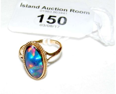 A 9ct gold oval opal dress ring