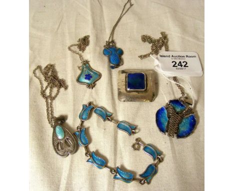 Four Art Nouveau silver and enamel pendants, a ditto bracelet and brooch