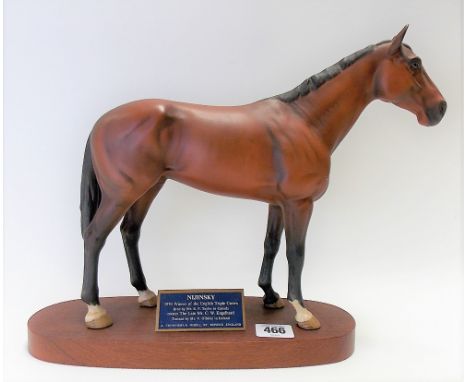 Beswick pottery matt glaze connoisseur model of the horse Nijinsky upon oval wooden base, height 28cm.
