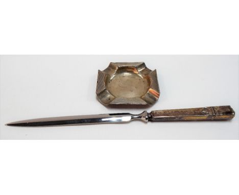 Small silver engine turned ashtray, Sheffield 1963, weight 0.62oz approx; together with a silver filled handle paperknife (2)
