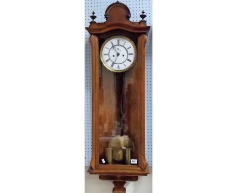 Walnut case Vienna two-train wall clock, the 7 inch white enamel dial with Roman numerals &amp; subsidiary seconds dial, twin