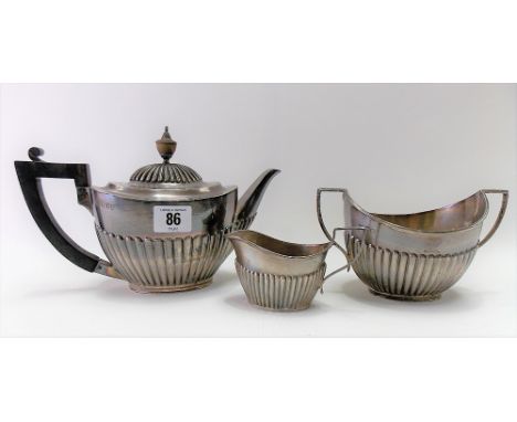 Victorian silver oval section half fluted teapot &amp; sucrier by Goldsmiths &amp; Silversmiths Company, London 1894 &amp; 18