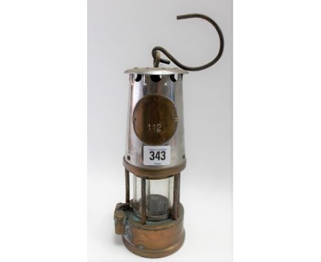 Miner's lamp 'The Protector Lamp &amp; Lighting Co Ltd, Eccles', no. 112, height 25cm.