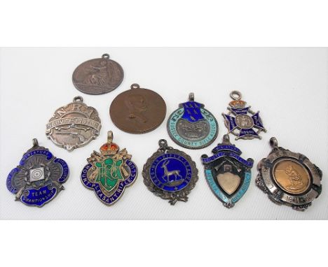 Seven silver &amp; enamel Rifle Association fob medals together with two Society of Miniature Rifle Club medals &amp; an N.R.