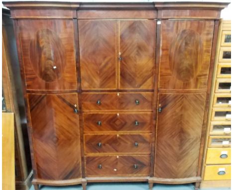 Early 20th Century Heals &amp; Son mahogany inlaid triple robe with matching mirrorback dressing table, the inverted break fr