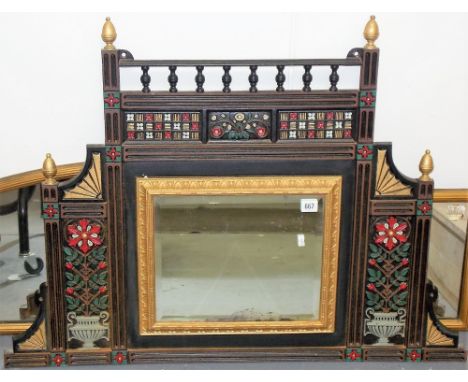Victorian aesthetic period cast iron painted over mantel mirror, the frame cast with trellis over the rectangular bevel edged