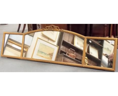 19th Century gilt gesso frame triple over mantel mirror, the central arched plate with ribbon scroll surmount, height 44cm x 
