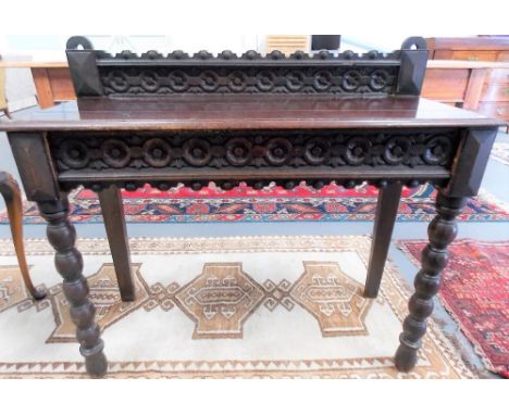 Victorian oak carved side table with single carved frieze drawer &amp; on bobbin turned supports