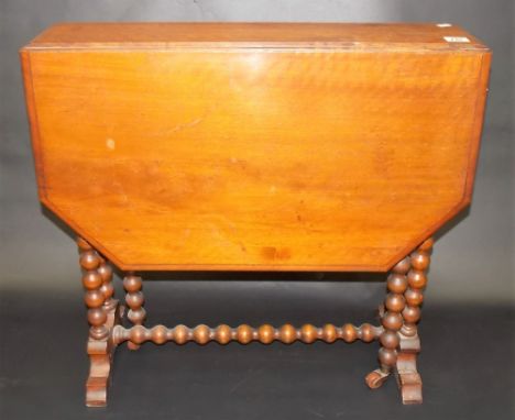 Edwardian mahogany Sutherland table, the moulded top with canted corners upon bobbin turned supports, width 63.5cm