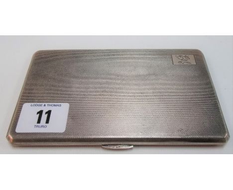 George VI silver engine turned cigarette case, Birmingham 1945, width 14cm, weight 7oz approx.