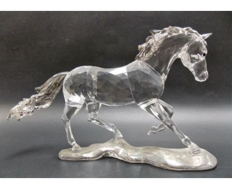 Swarovski crystal model of a galloping horse, width 18.5cm.