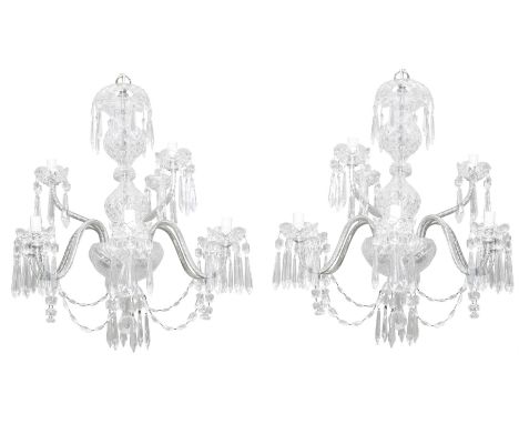 A PAIR OF CONTEMPORARY WATERFORD CUT CRYSTAL CHANDELIERS, each fitted with nine scroll arm branches with upturned light socke