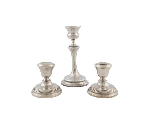 A SILVER CANDLESTICK, Birmingham 1918, mark of S Blanckensee & Son Ltd, the circular reeded socket above knopped stem and pla