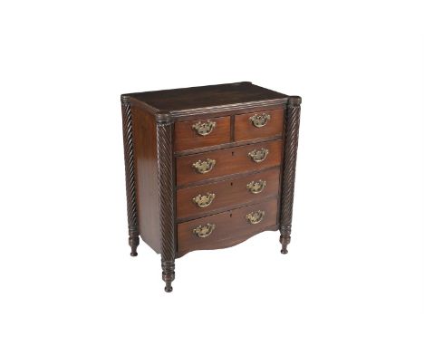 A 19TH CENTURY COMPACT MAHOGANY CHEST-OF-DRAWERS, of rectangular form with spiral turned outset pilasters, fitted with two sh