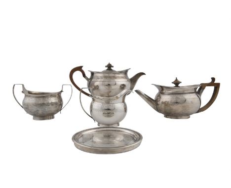 A GEORGE III SILVER TEA AND COFFEE SERVICE, London 1802, mark of The Hennells, comprising coffee pot, teapot (1804), cream ju