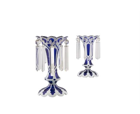 A COLLECTION OF GLASS COMPRISING: a pair of blue glass lustres with white enamel; and a ruby glass goblet and lid with gilt d