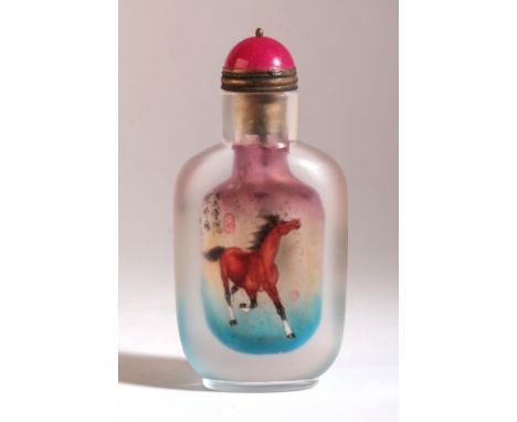 A CHINESE INSIDE PAINTED GLASS SNUFF BOTTLE 20th century, decorated with prancing horses to both sides, with seal marks and i