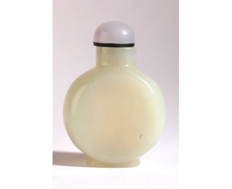 A CHINESE JADE SNUFF BOTTLE 18th century, of flattened circular form, 6cm high overallThe Dick Hardy Collection.