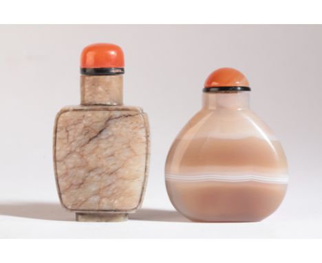 A CHINESE JADE SNUFF BOTTLE 19th century, of diminutive rectangular form, with raised panels on all four sides, 5cm high over